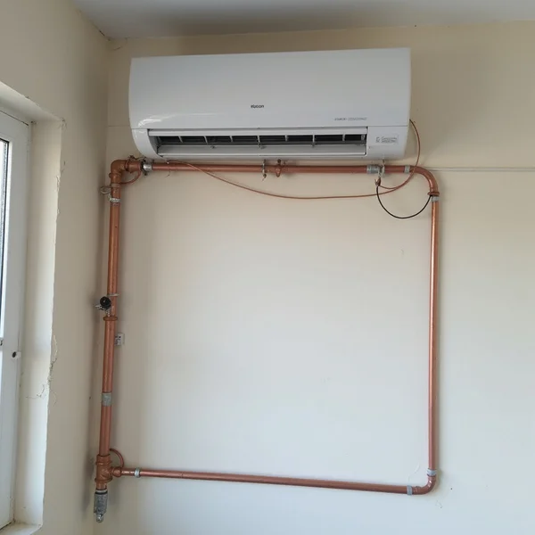 Neat aircond installation in Malaysian terrace home